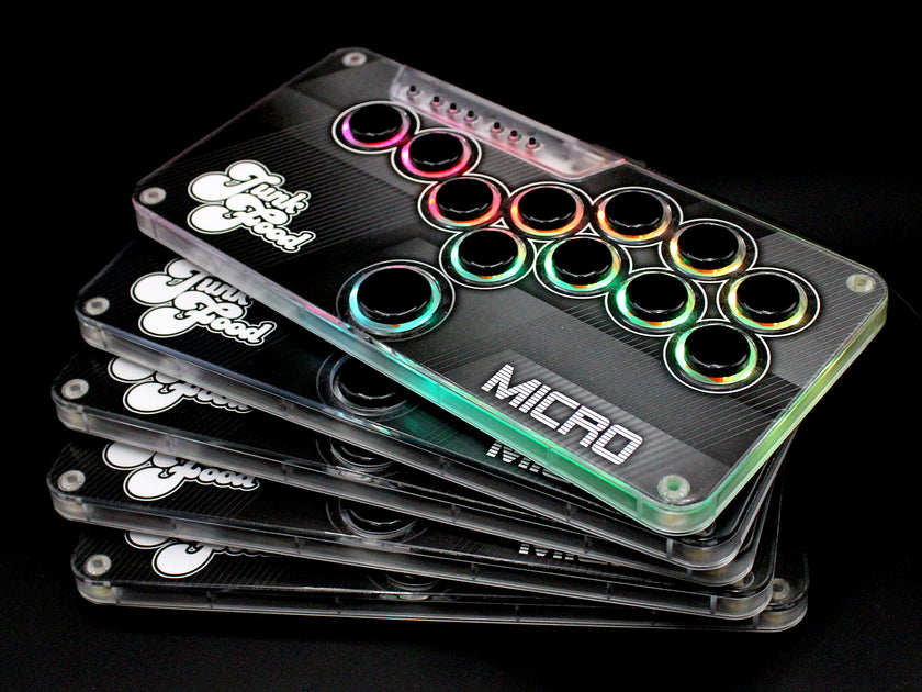 Stack of five Snack Box MICRO leverless FGC fight stick controllers with JunkFood artwork