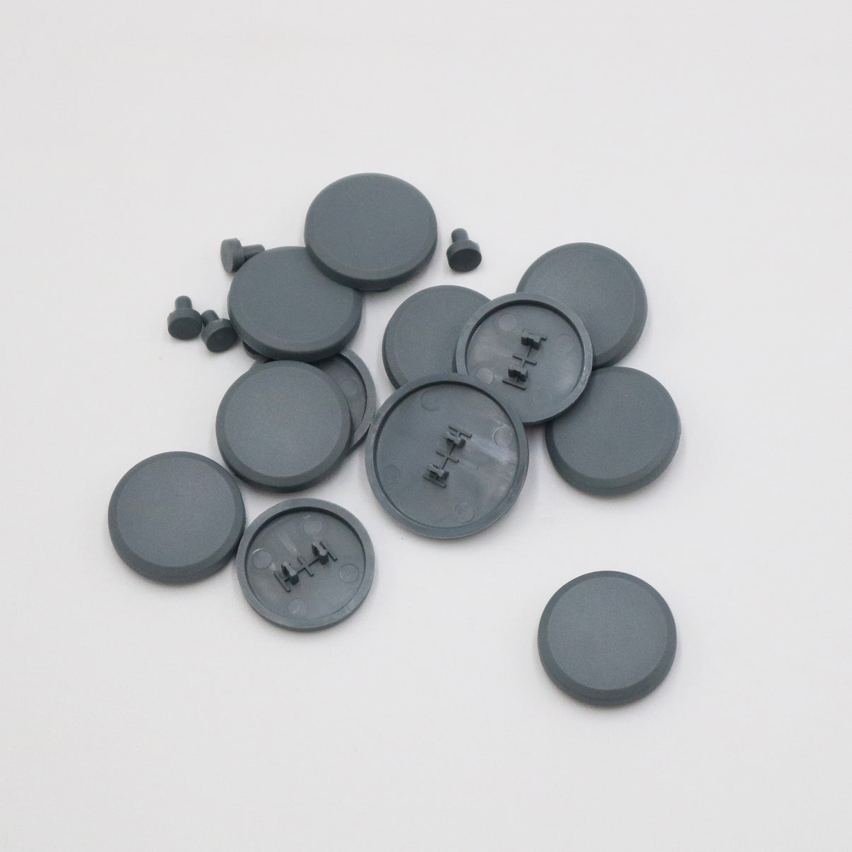 A set of 12 grey colored concave shaped keycaps for the SnackBox MICRO.