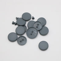 A set of 12 grey colored concave shaped keycaps for the SnackBox MICRO.