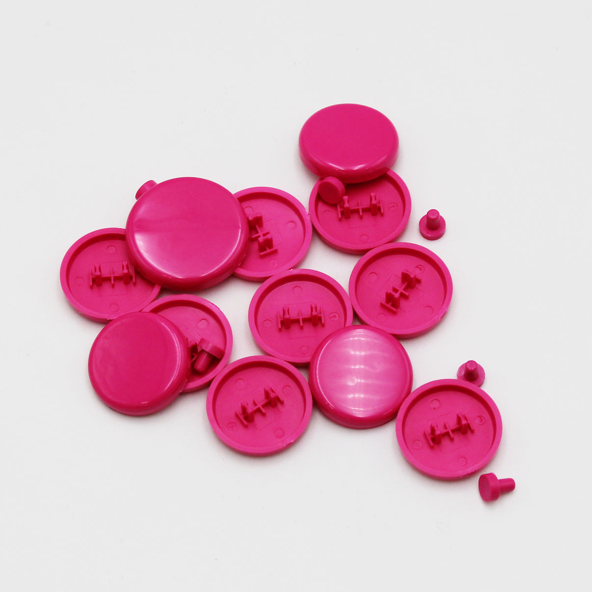 A set of 12 pink convex shaped keycaps for the SnackBox MICRO.