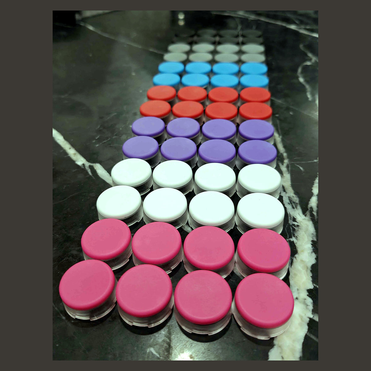 Sets of 8 raised keycaps for the SWORL leverless FGC fight stick controller in white, blue, pink and orange