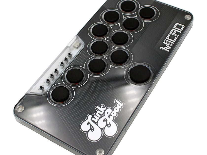 Angled view of the Snack Box MICRO leverless FGC fight stick controller with JunkFood artwork and black buttons