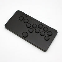 The black, one-piece case version of the SnackBox Micro from JunkFood Arcades.